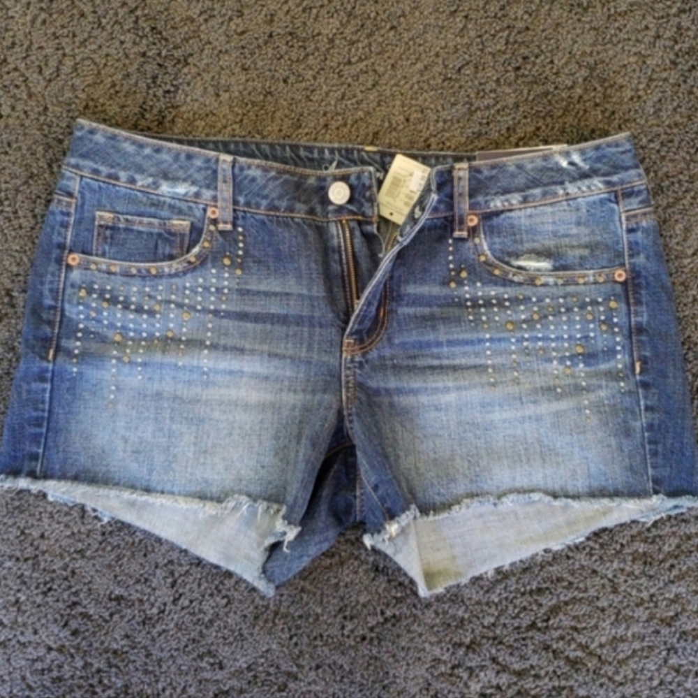 American Eagle studded midi jean shorts